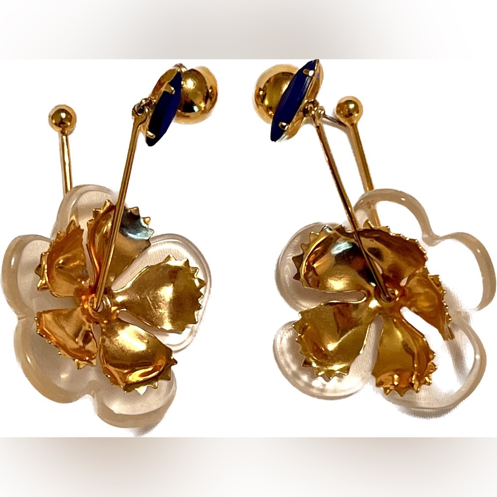 Gold flower drop earrings with blue stone
